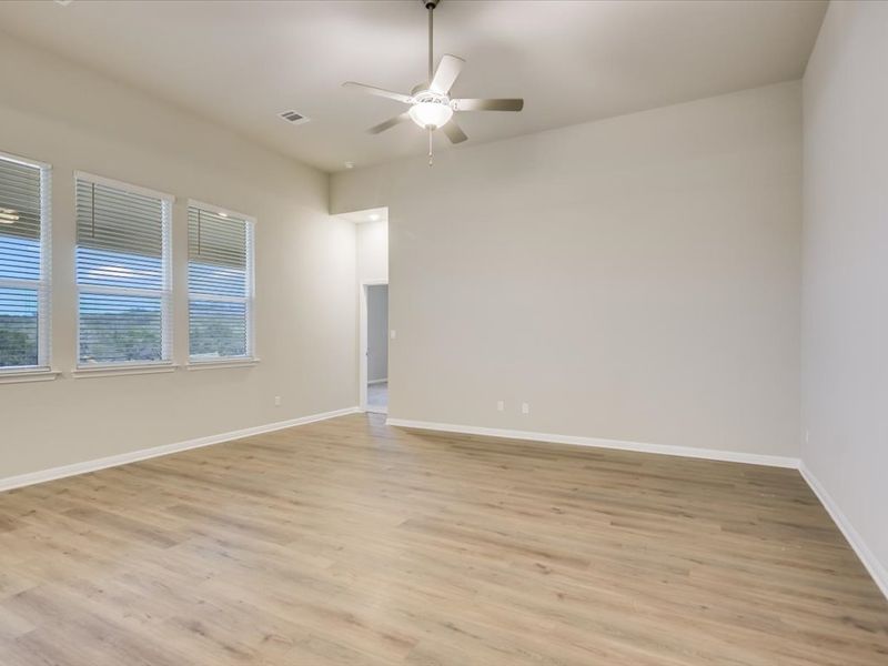 Spacious, unfurnished interior of a new home in Big Sky Ranch - Executive Collection, Dripping Springs (Image 6).