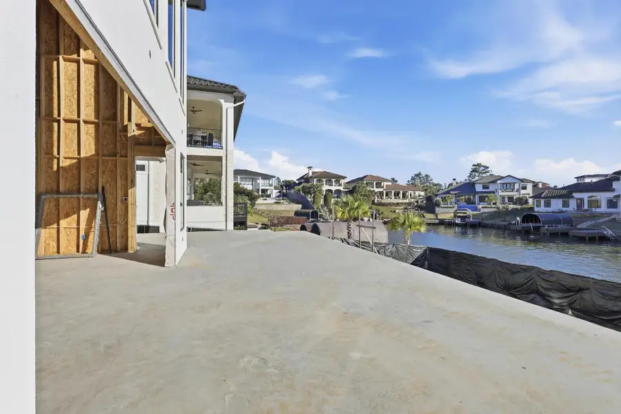 Exterior details and patio area of a home in , Conroe (Image 3).
