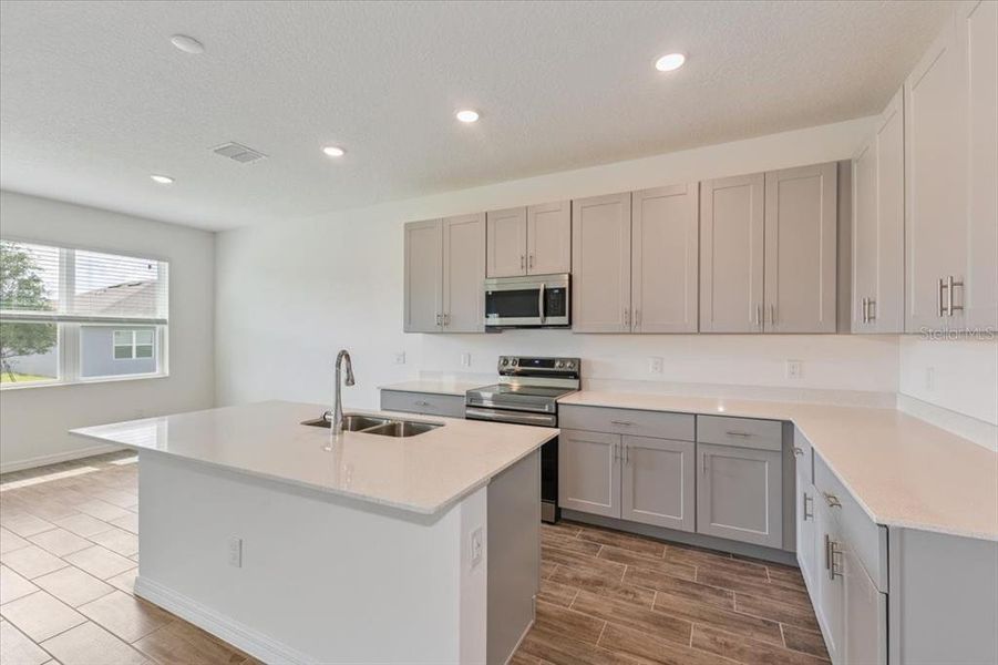 Furnished interior view inside a new home in Leela Reserve, Tavares (Image 2). Furnished interior view inside a new home in Leela Reserve, Tavares (Image 2).