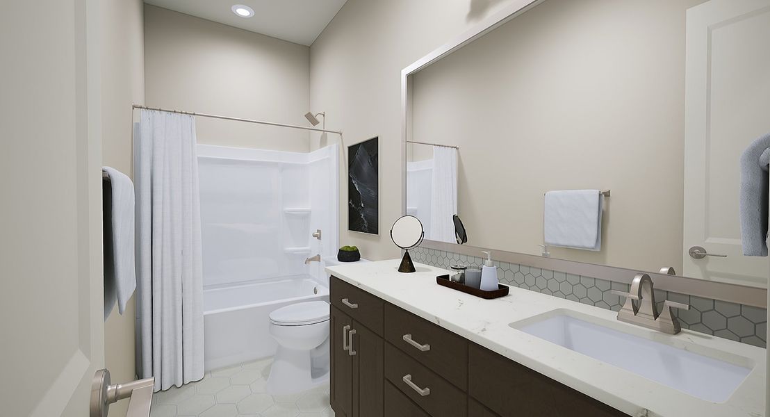 Representative furnished interior of a home built from the Calderwood Plan 4504 by Tri Pointe Homes in Waterston Central, Gilbert (Image 12).