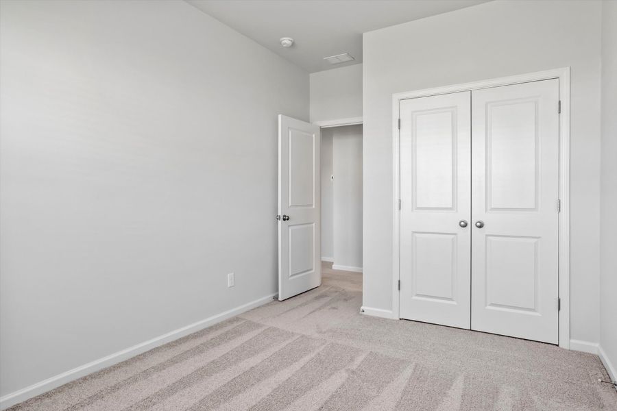 Spacious, unfurnished interior of a new home in West Main Townhomes, Sanford (Image 26).