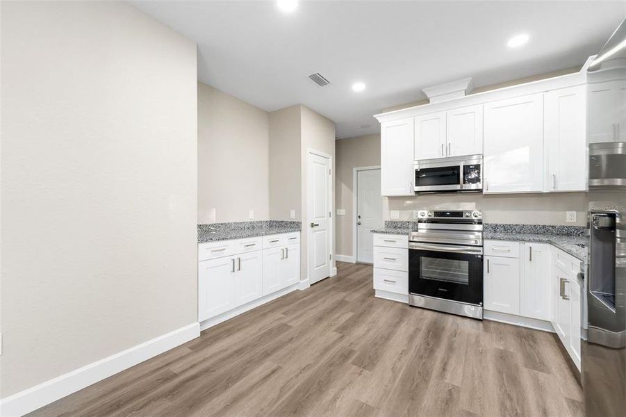 Furnished interior view inside a new home in , Gainesville (Image 7).