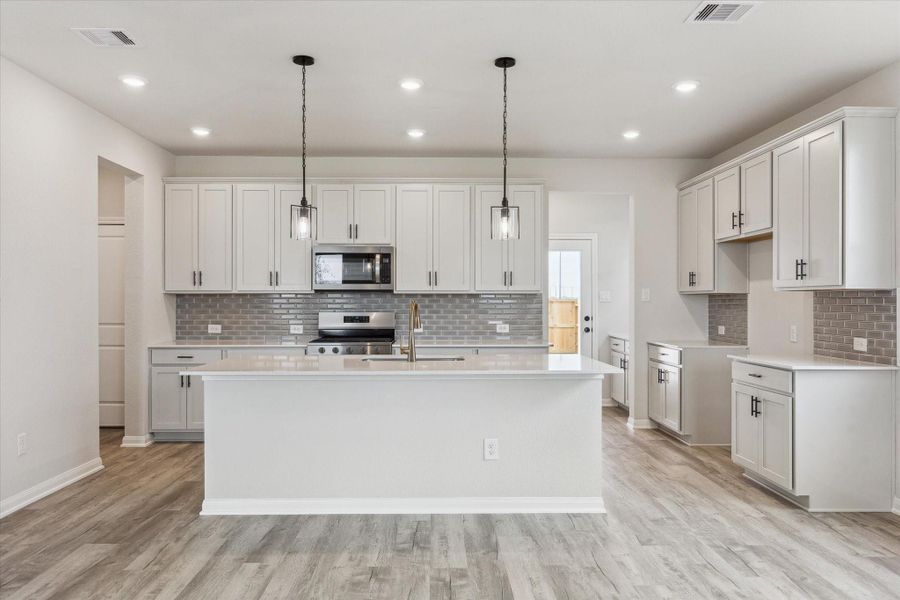 Furnished interior view inside a new home in Elyson, Katy (Image 9).