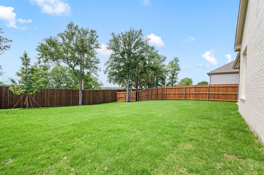 Front exterior of a new home in Parks of Aledo, Aledo, TX, highlighting curb appeal (Image 20). Front exterior of a new home in Parks of Aledo, Aledo, TX, highlighting curb appeal (Image 20).