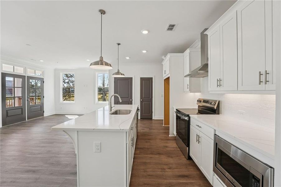 Furnished interior view inside a new home in Market Square at Sawnee Village, Cumming (Image 12).