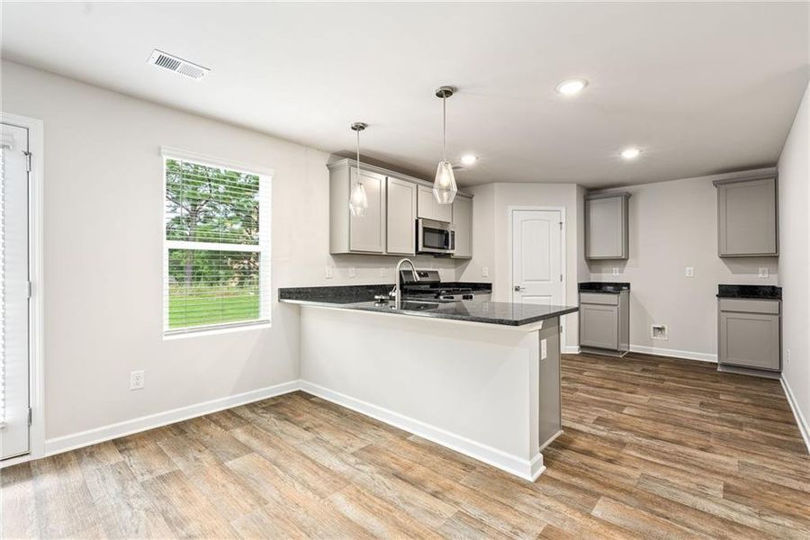 Furnished interior view inside a new home in Crossvine Village, LaGrange (Image 2). Furnished interior view inside a new home in Crossvine Village, LaGrange (Image 2).