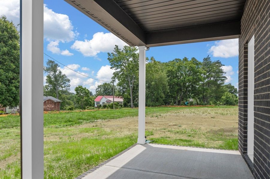 Exterior details and patio area of a home in Woods Crossing, Gallatin (Image 4).