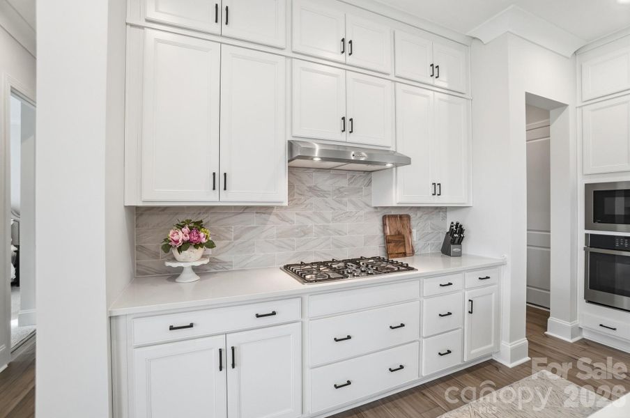 Furnished interior view inside a new home in , Belmont (Image 38).