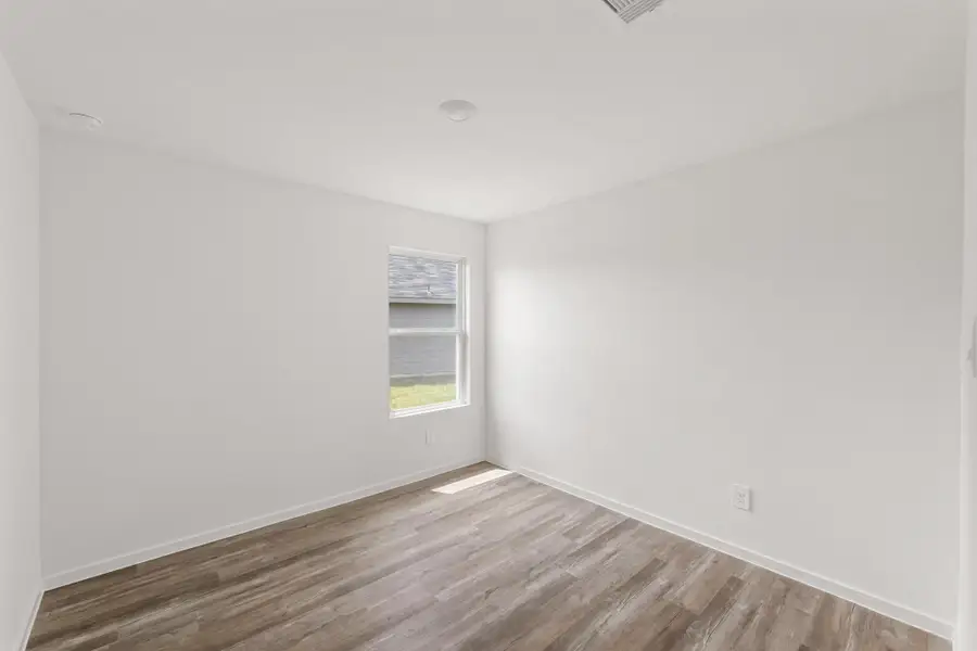 Spacious, unfurnished interior of a new home in Harrington Trails at The Canopies, Splendora (Image 15). Spacious, unfurnished interior of a new home in Harrington Trails at The Canopies, Splendora (Image 15).