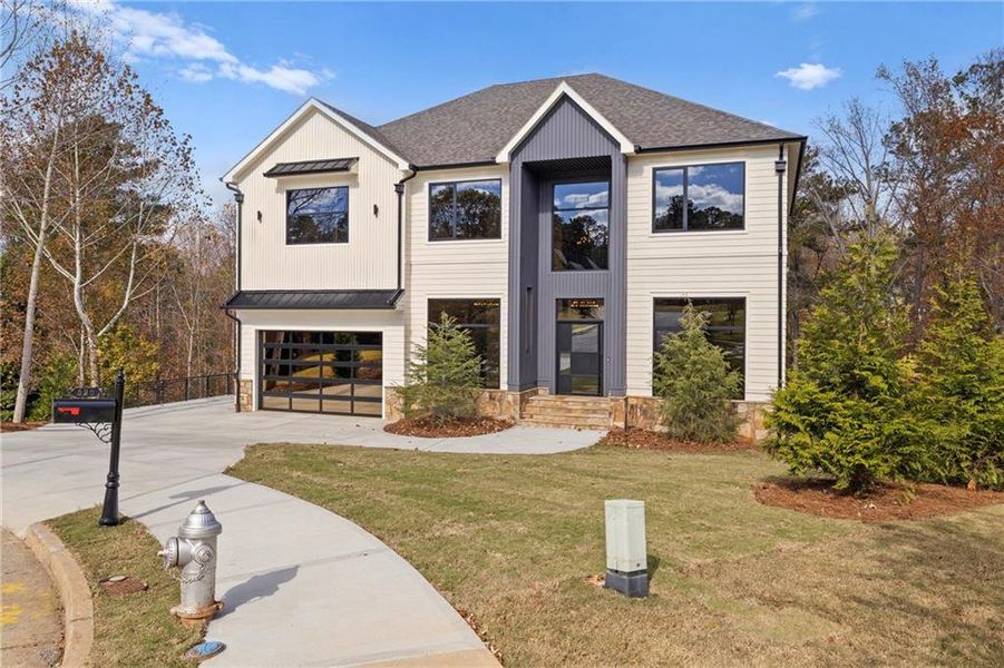 Front exterior of a new home in , Milton, GA, highlighting curb appeal (Image 34).