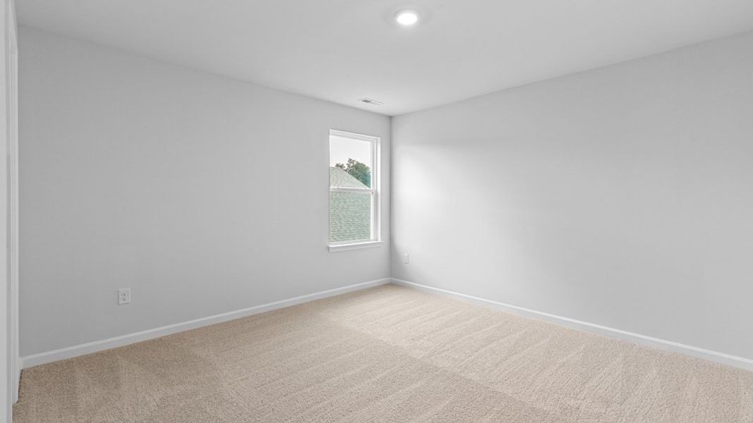 Spacious, unfurnished interior of a new home in The Reserve at Stoney Creek, Whitsett (Image 21).