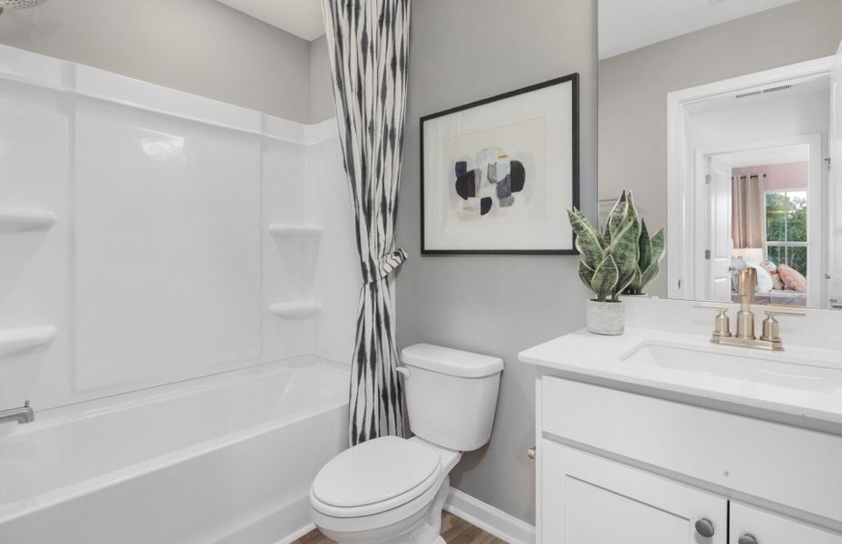 Furnished interior view inside a new home in Carpenter Falls, Durham (Image 3).