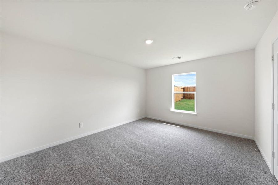 Unfurnished room featuring carpet and recessed lighting