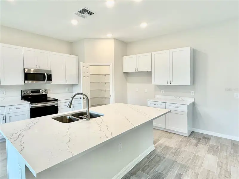 Furnished interior view inside a new home in , Eustis (Image 5).