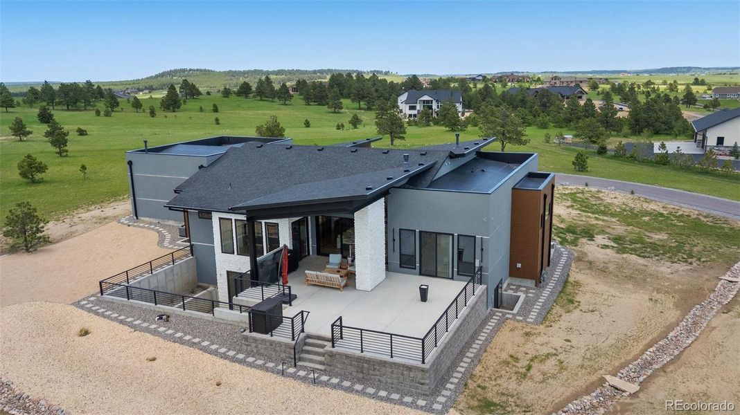 Back view with stairs up from courtyard