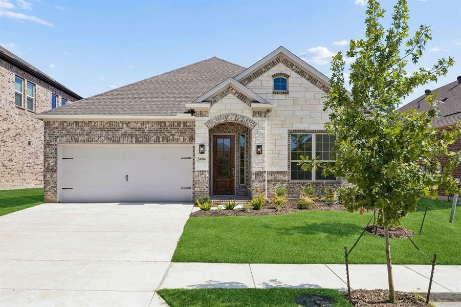 Front exterior of a new home in Country Lakes, Denton, TX, highlighting curb appeal (Image 2). Front exterior of a new home in Country Lakes, Denton, TX, highlighting curb appeal (Image 2).