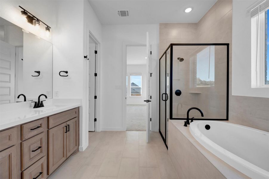 Furnished interior view inside a new home in Heritage, Dripping Springs (Image 13).