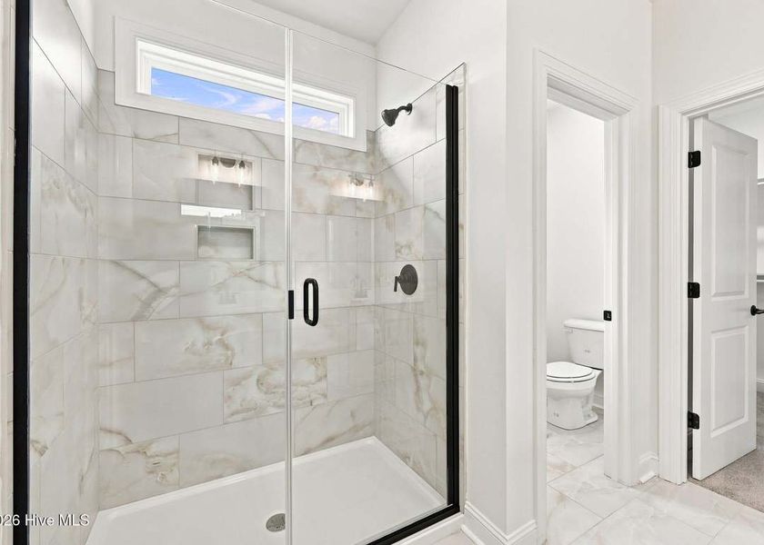 Furnished interior view inside a new home in Dixon Grove, Grimesland (Image 10).
