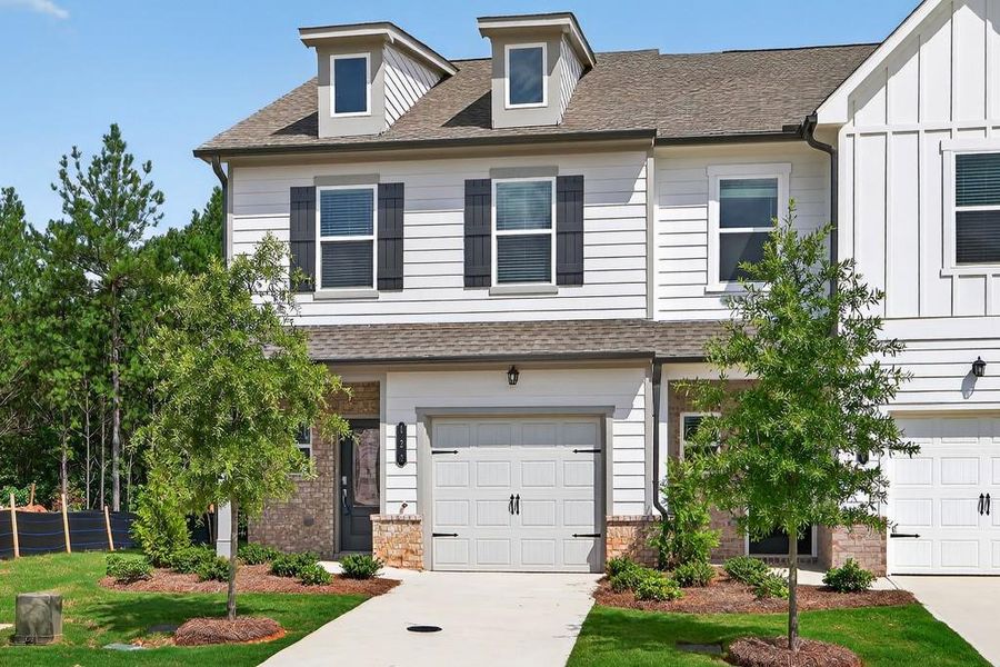 Front exterior of a new home in Fernhurst, McDonough, GA, highlighting curb appeal (Image 19).