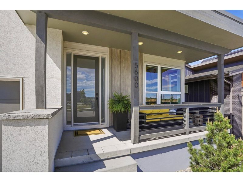 Exterior details and patio area of a home in West Grange, Longmont (Image 4).