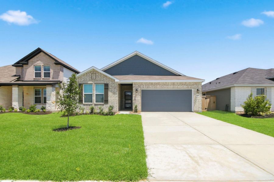 Front exterior of a new home in Maple Woods, Hockley, TX, highlighting curb appeal (Image 2). Front exterior of a new home in Maple Woods, Hockley, TX, highlighting curb appeal (Image 2).