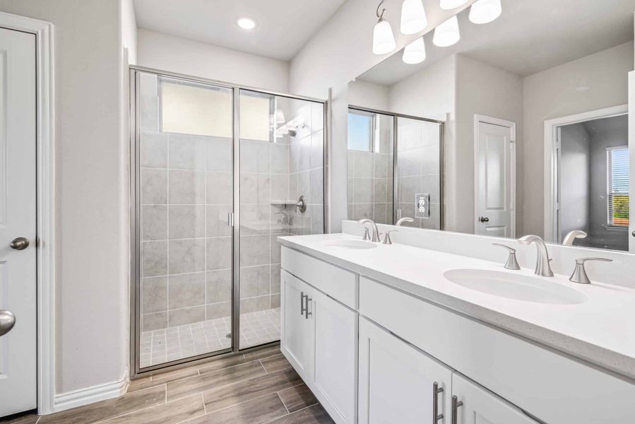 Representative furnished interior of a home built from the The Tulip by Lillian Custom Homes in The Preserve, Sherman (Image 8).
