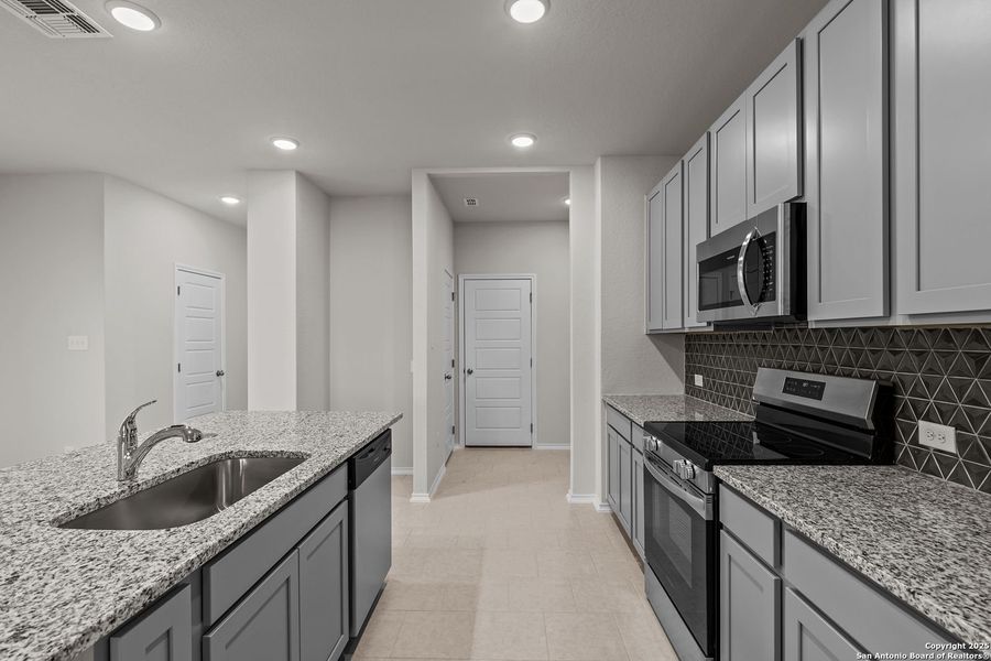 Furnished interior view inside a new home in Applewhite Meadows, San Antonio (Image 43). Furnished interior view inside a new home in Applewhite Meadows, San Antonio (Image 43).