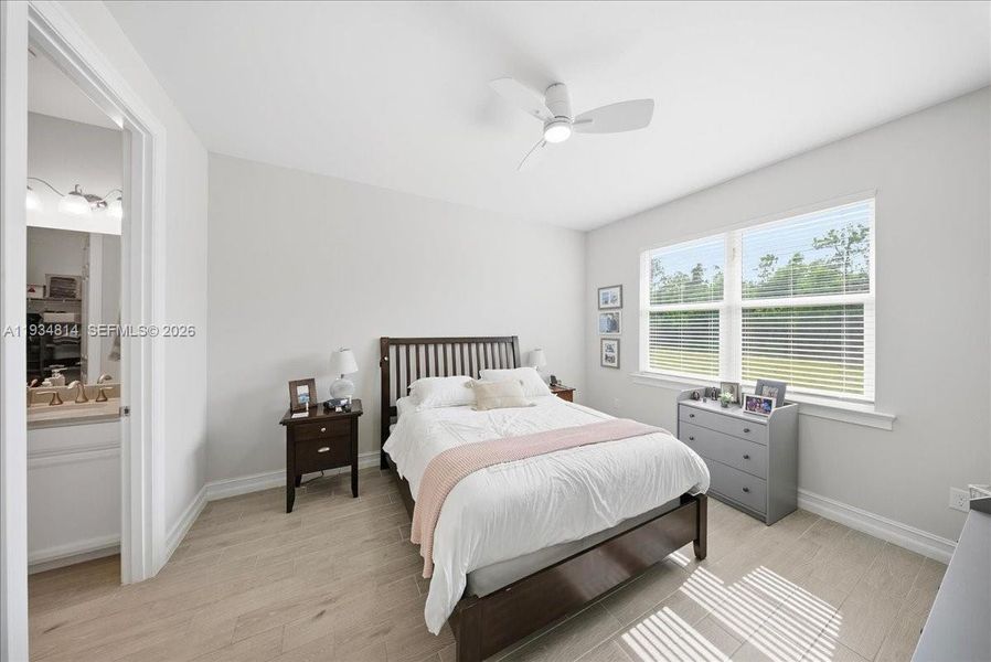 with light wood-style tile flooring