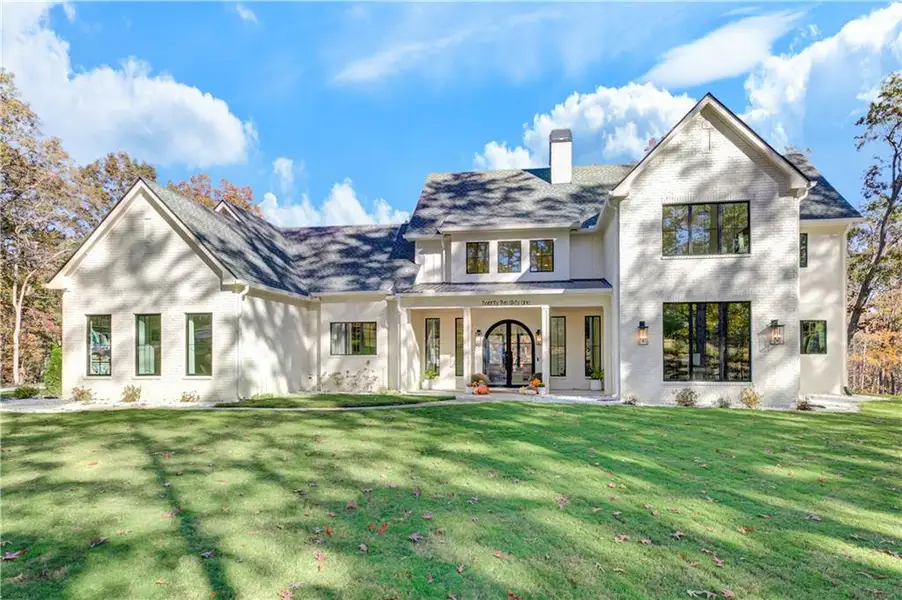 Front exterior of a new home in , Ball Ground, GA, highlighting curb appeal (Image 1). Front exterior of a new home in , Ball Ground, GA, highlighting curb appeal (Image 1).