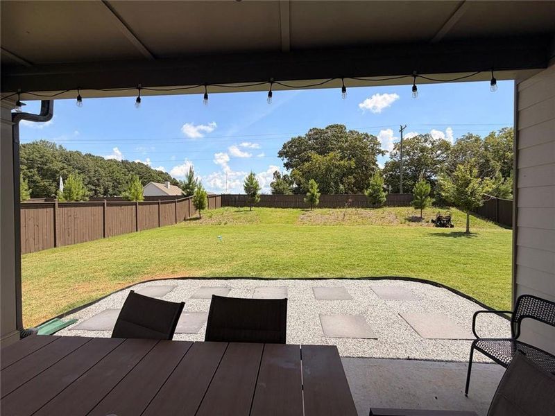 Exterior details and patio area of a home in Wehunt Meadows, Hoschton (Image 3).