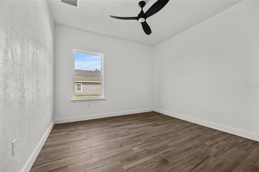 Spacious, unfurnished interior of a new home in Grand Oaks, Gainesville (Image 25).
