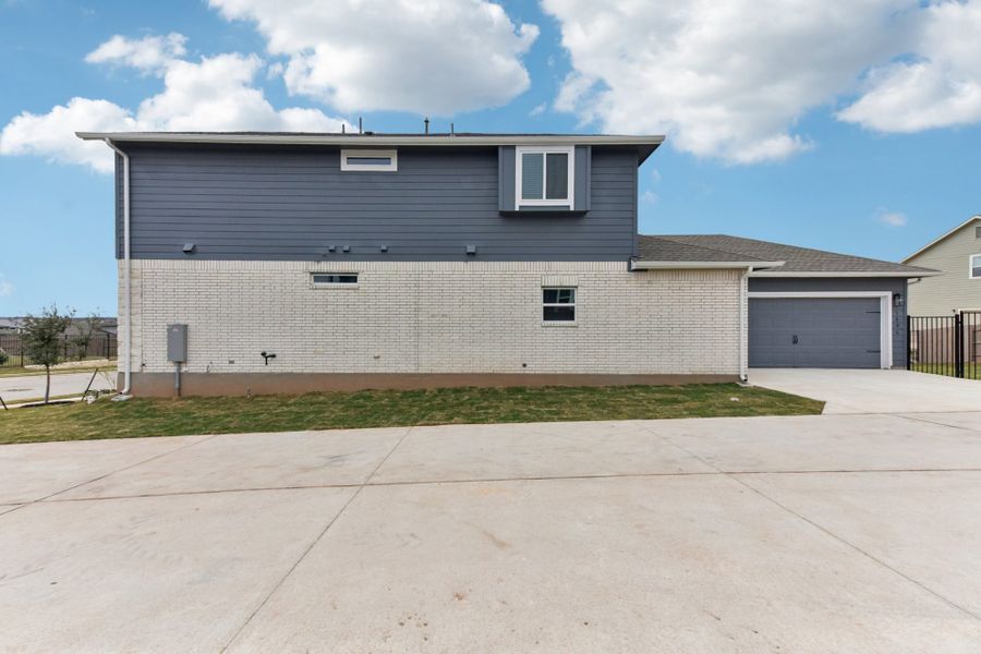 Exterior details and patio area of a home in Easton Park, Austin (Image 18).