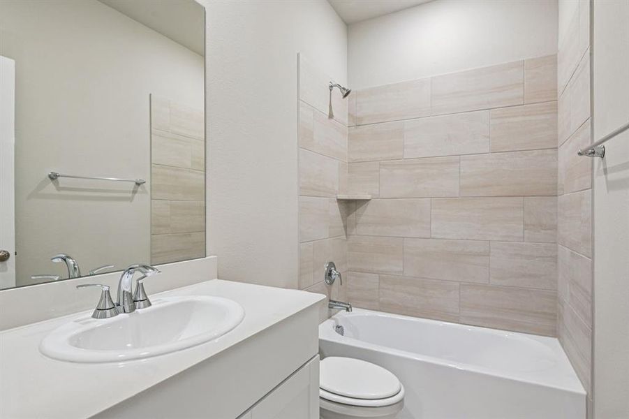 Furnished interior view inside a new home in Parks at Foster Crossing - Signature Series, Anna (Image 9).