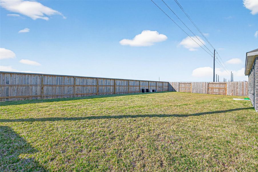 Exterior details and patio area of a home in The Grand Prairie, Hockley (Image 20).