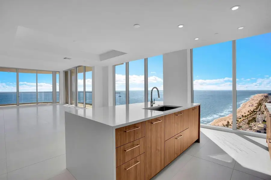 Island, dining, and living area