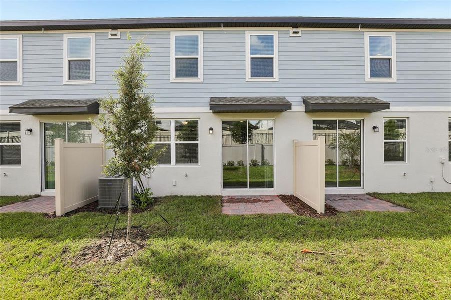 Exterior details and patio area of a home in Cagan Crossings West, Clermont (Image 23).