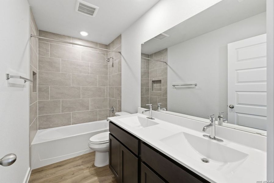 Furnished interior view inside a new home in Talley Fields, San Antonio (Image 12).