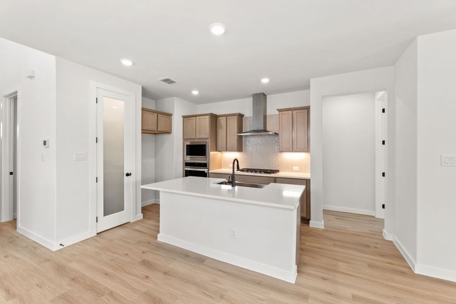 Furnished interior view inside a new home in Veranda Designer, San Antonio (Image 8).