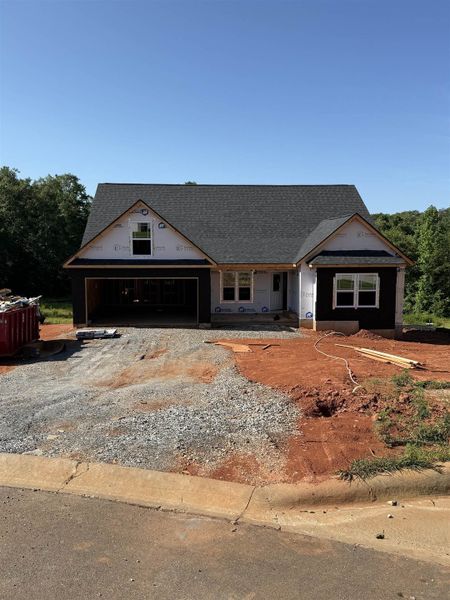 Front exterior of a new home in Fall Creek, Inman, SC, highlighting curb appeal (Image 1).