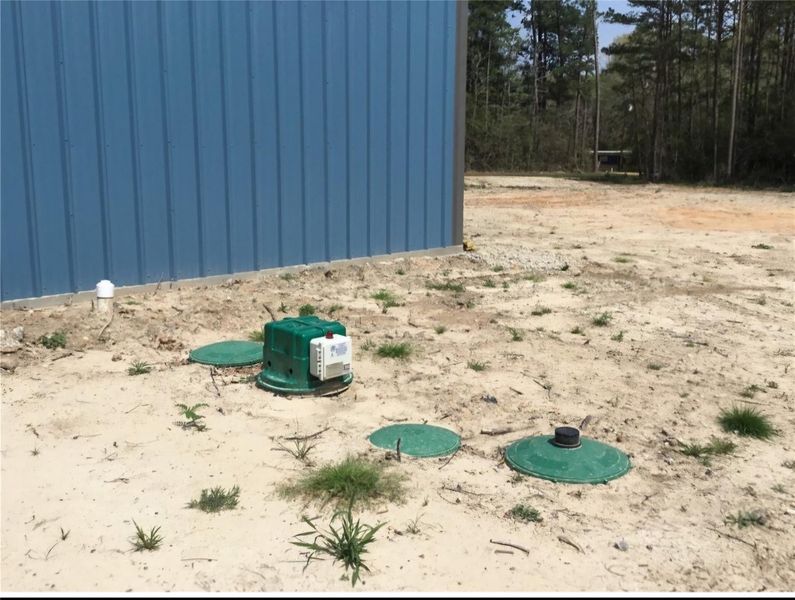 Property features fully installed aerobic septic system as well as public water Property features fully installed aerobic septic system as well as public water