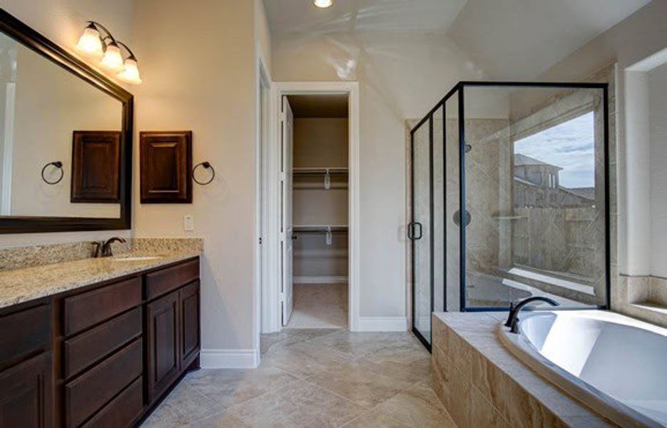 Representative furnished interior of a home built from the 3326 by Ravenna Homes in The Woodlands Hills 65′, Willis (Image 10).