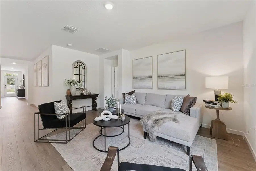 Furnished interior view inside a new home in Crossroads at Kelly Park, Apopka (Image 7).