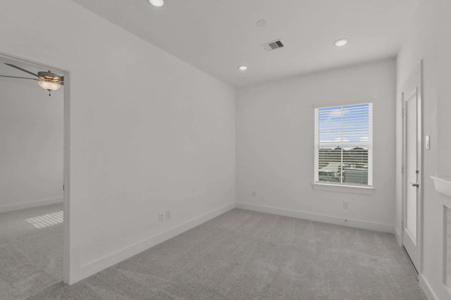 Representative unfurnished interior of a home built from the Riverdale by Chesmar Homes in Meridiana Courtyard Collection, Manvel (Image 22).