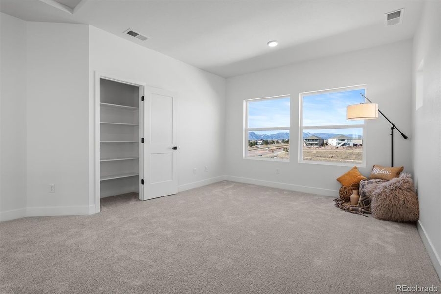 Spacious, unfurnished interior of a new home in Revel Crossing at Wolf Ranch - The Panorama Collection, Colorado Springs (Image 30).