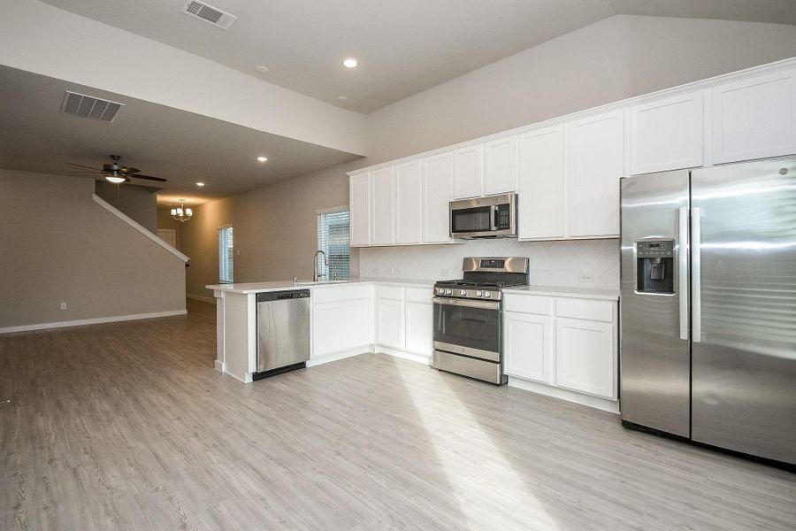 Furnished interior view inside a new home in Marvida, Cypress (Image 7).