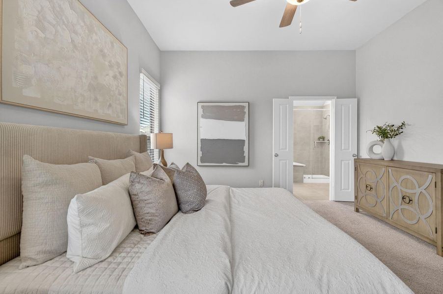 Another view of the master bedroom looking towards the spa-like master bathroom. Another view of the master bedroom looking towards the spa-like master bathroom.