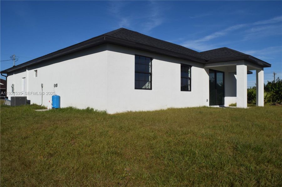 Exterior details and patio area of a home in , Lehigh Acres (Image 26). Exterior details and patio area of a home in , Lehigh Acres (Image 26).