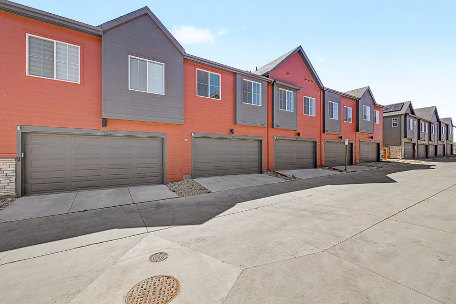 Front exterior of a new home in Arras Park, Thornton, CO, highlighting curb appeal (Image 15).