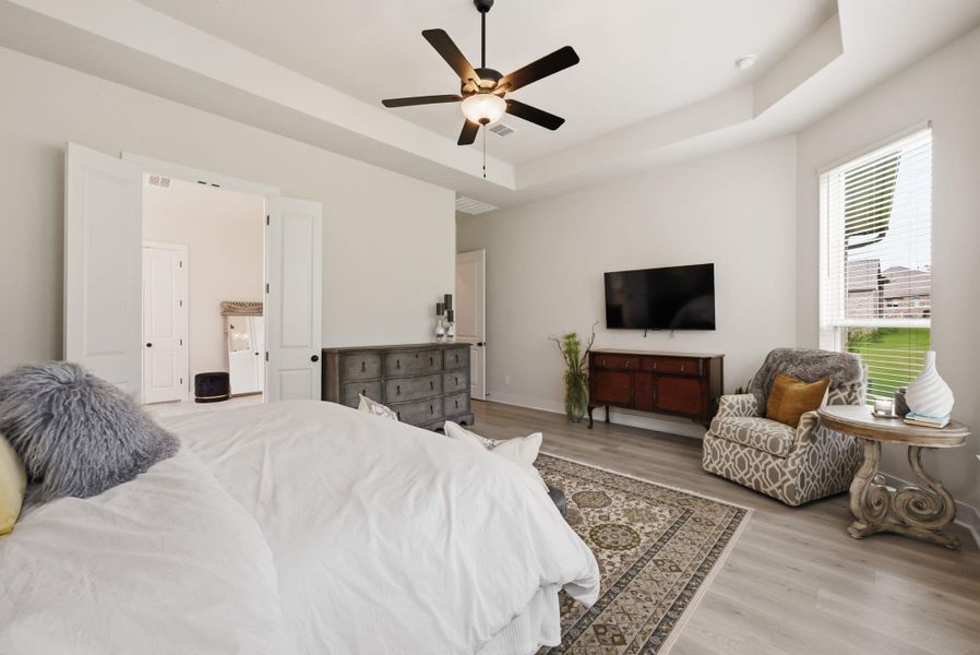 With generous square footage, this main bedroom easily accommodates all of your king-sized furniture with plenty of extra room left over for a dedicated reading or sitting area