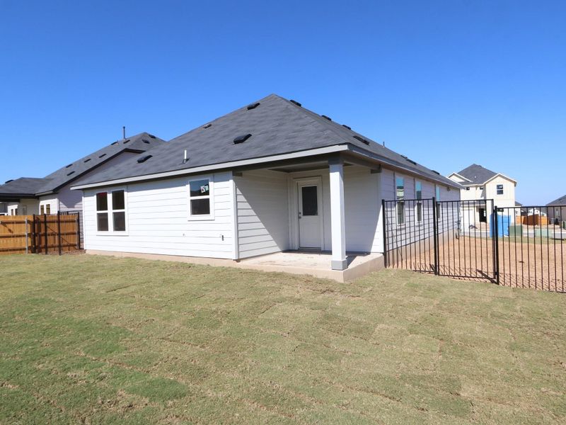 Exterior details and patio area of a home in Cascades at Onion Creek, Austin (Image 11).